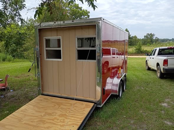 The back of the trailer with the ramp down and the serving window open